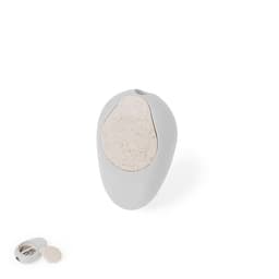 A grey pencil sharpener with a light-coloured sharpening compartment, featuring a detachable lid.