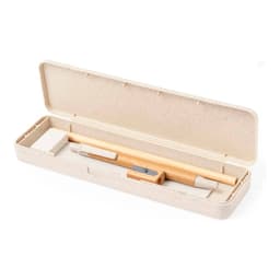 A writing set in a beige case, featuring a pencil, sharpener, eraser, and a pen. The case has a logo.