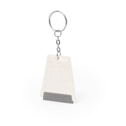 A keyring ice scraper in white with a grey scraping edge, attached to a metal keyring.