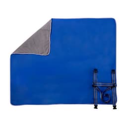 A blue picnic rug with a grey underside, featuring straps for securing. It has a simple, functional design.