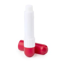 A red and white lip balm tube positioned upright with a red cap beside it. The product has a brand logo.