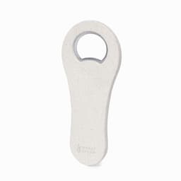 A drink bottle opener made from wheat straw, featuring a sleek, light grey design and a circular opening.