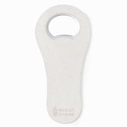 A drink bottle opener made from wheat straw, featuring a rounded handle and a silver ring for opening bottles.