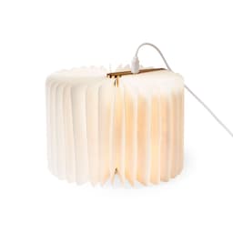 A lamp with a flexible, pleated white shade and a wooden base, showcasing a warm glow and a power cord.