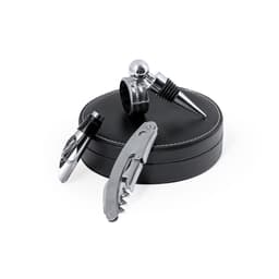 A drink bottle accessory set in a black leather case, featuring a corkscrew, bottle stopper, and pourer.
