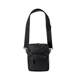 A black crossbody bag featuring an adjustable strap and multiple zippered compartments. It has a logo on the front.