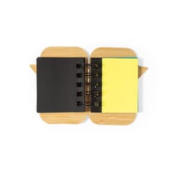 A Mabur Notebook with a wooden cover, featuring black and yellow sticky notes inside. It has a spiral binding.