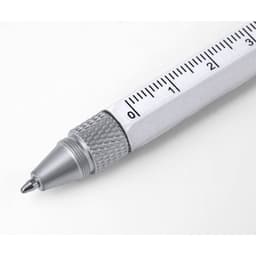 A silver multifunction pen with a ruler design and a textured grip, featuring a logo on the side.