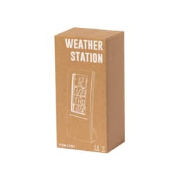 A brown cardboard box containing a weather station, featuring a logo and illustrations on the front.