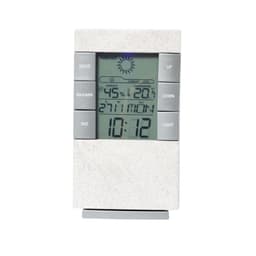 A white and silver weather station displaying temperature, humidity, and time with a digital screen and buttons.