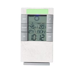 A weather station with a white body displaying temperature, humidity, and time, featuring various control buttons.