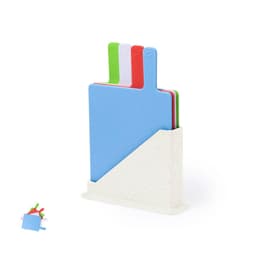 A set of colourful chopping boards in blue, green, white, and red, housed in a white stand.