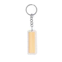 A keyring featuring a wooden rectangular plate framed in a light grey concrete design.