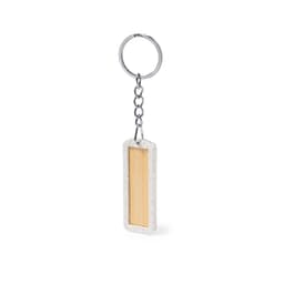 A keyring featuring a rectangular design with a natural bamboo centre and a textured grey frame. Includes a metal chain.