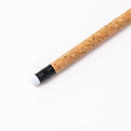 A cork-textured pencil with a black eraser at one end, featuring a simple design without additional branding.