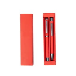 A gift box containing two red metal pens with black accents. The box is also red and features a logo.