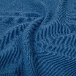 A polar fleece jacket in a rich blue colour, featuring a soft and textured fabric. The jacket has a visible logo.