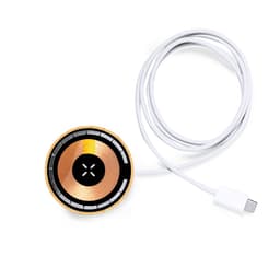 A circular wireless charger in gold and black, featuring a white USB-C cable. It includes a logo.
