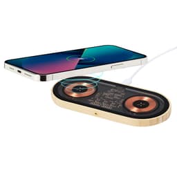 A wireless charger in a wooden casing, featuring two charging pads and a smartphone placed above it.