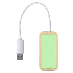 A USB hub with a natural wood design and a white cable connector, featuring a plain green surface.