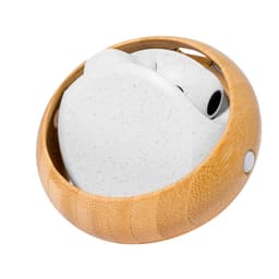 A set of white earphones neatly stored in a circular bamboo case. The case features a smooth, natural finish.