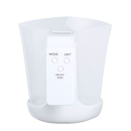 A white Plazix Measuring Scale with a transparent measuring cup and button controls for mode and unit settings.