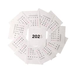 A desk calendar for 2025 featuring multiple months displayed in a circular arrangement, with red and black accents.