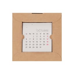 A desk calendar featuring a grid layout for October, displayed in a cardboard holder. The calendar has red and green highlights.