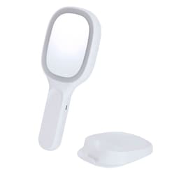 A white handheld mirror with a detachable base is featured in the image, showcasing a sleek, modern design.