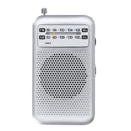 A small silver radio with a dial for tuning AM and FM frequencies, featuring a speaker grille and branding.