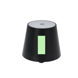 A black lamp with a conical shape, featuring a green illuminated vertical strip and a white top. It has a logo on its surface.