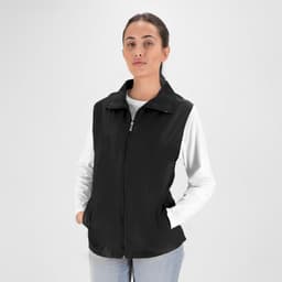 A black vest jacket with a zip front, featuring side pockets and a collar, worn by a model.