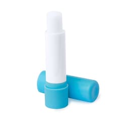 A lip balm in a white tube with a light blue cap, displayed upright and on its side. The product includes branding.