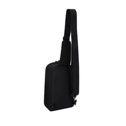 A sleek black Palan Bag with a single shoulder strap and a compact design, featuring a logo.