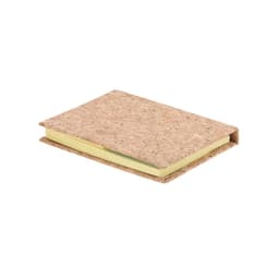 A cork-covered notebook with yellow pages and a simple design. It features a logo on the cover.