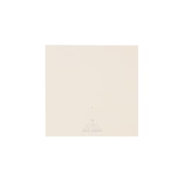 A square, off-white notepad made from recycled milk cartons, featuring a subtle logo at the bottom.