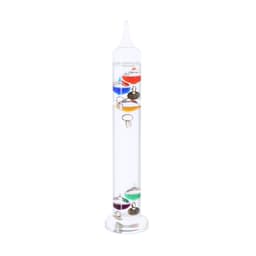 A clear Galileo thermometer with coloured glass floats, each marked with a temperature scale, in a tall cylindrical shape.