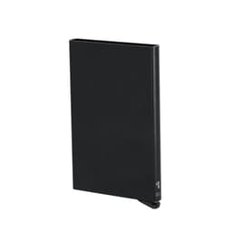A black slim notebook with a minimalistic design and a small logo on the side.