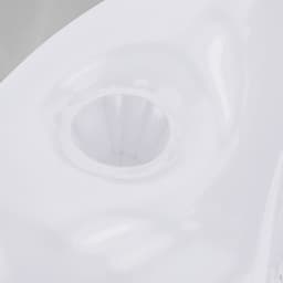 A white Kokoro Armchair featuring a smooth, modern design with a central opening.