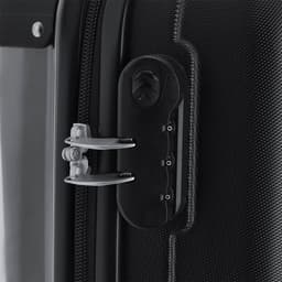 A close-up of a black wheeled bag featuring a secure locking mechanism and zippers. The bag has a textured surface.
