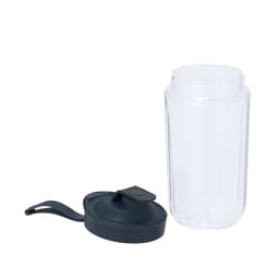 A clear blender bottle with a dark grey lid. The bottle is designed for blending and mixing beverages.