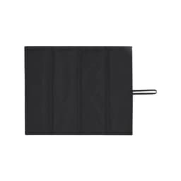 A black outdoor product with multiple compartments and a secure closure. Features a strap for easy handling.