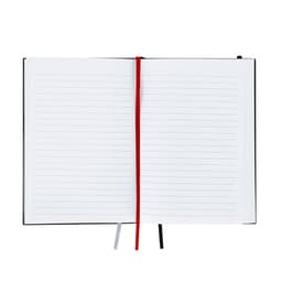 An open Suran Notebook featuring lined pages, with a black cover and red ribbon bookmark.