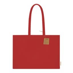 A red tote bag with long handles and a tag, featuring a simple design and a branding logo.