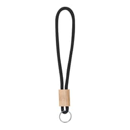 A walnut keyring with a natural wooden block and a black loop strap, featuring a metal keyring attachment.