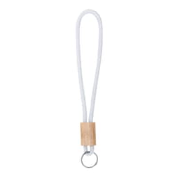 A walnut keyring with a looped white cord and a wooden accent, featuring a metal ring at the end.