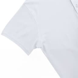 A white polo shirt with a collar and short sleeves, featuring a logo on the chest.