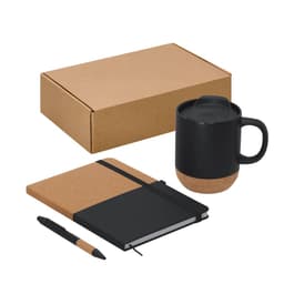 A black drink mug with a cork base, a black notebook with a cork cover, and a black pen in a plain box.