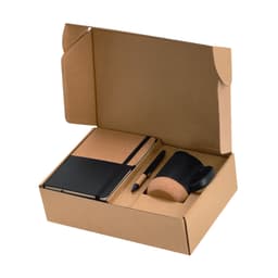 A gift set featuring a black notebook with cork cover, a black mug with cork accent, and a pen, all in a brown box.