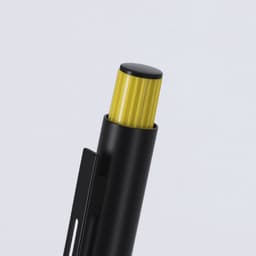A metal pen with a black body and a textured yellow cap, featuring a clip for easy attachment.